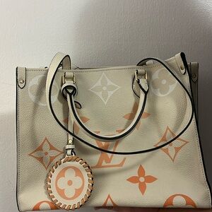 Louis Vuitton OnTheGo MM)